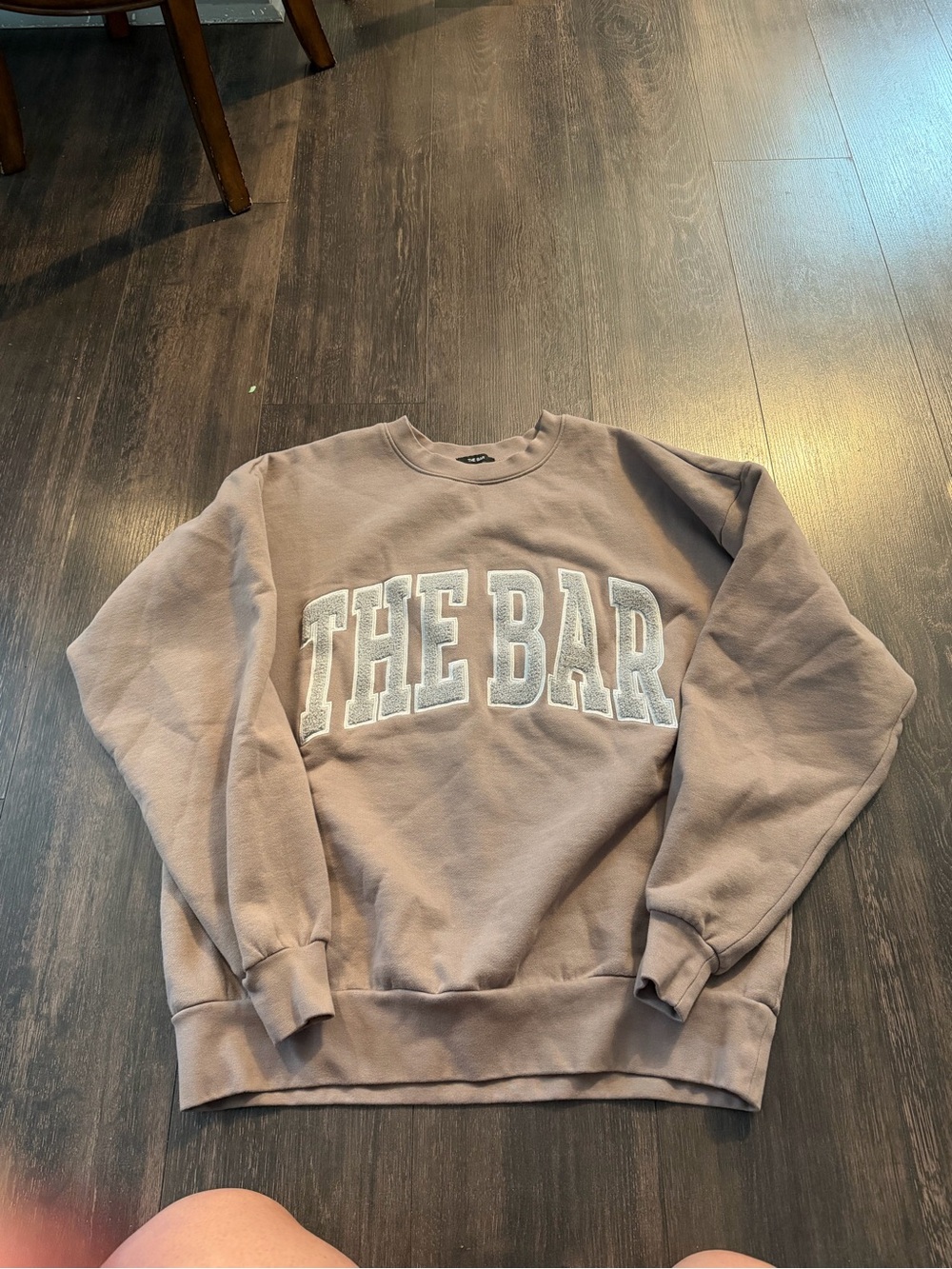 The Bar Crewneck Sweatshirt in Taupe with White Lettering